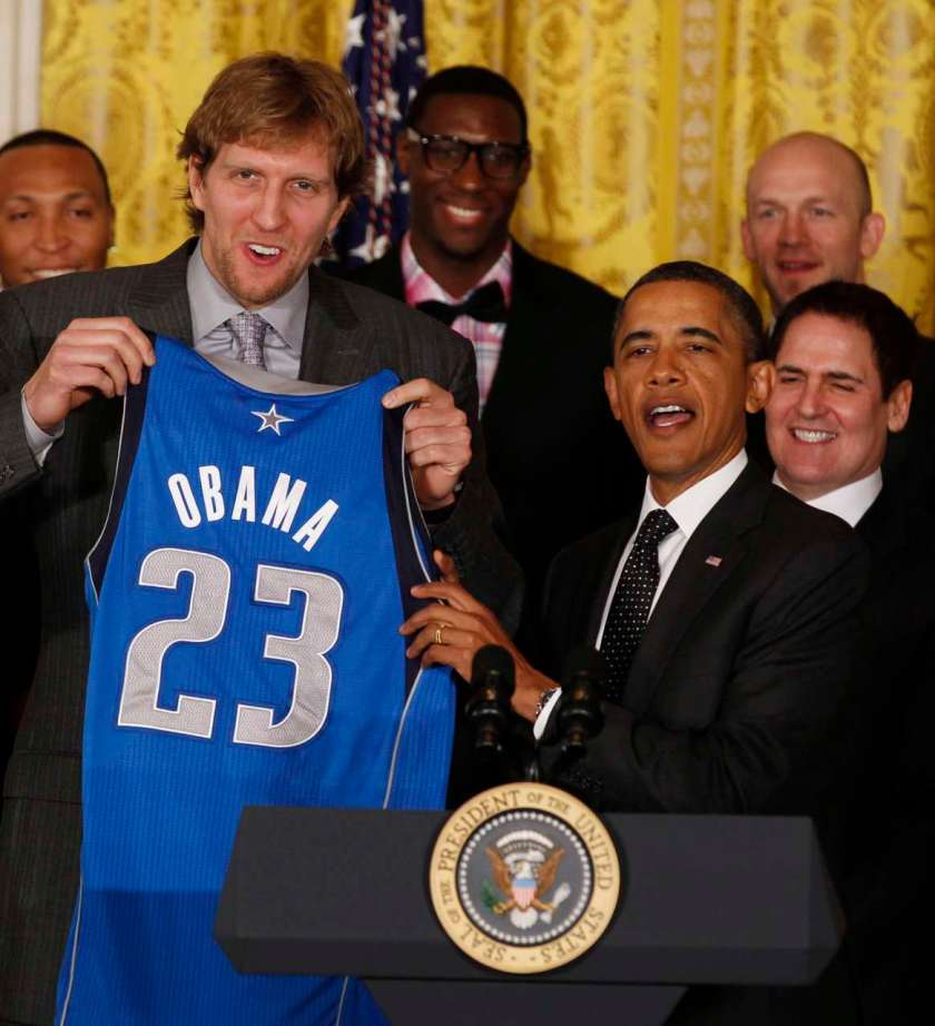 U.S. President Obama receives jersey from 2011 NBA champions Dallas Mavericks at the White House in Washington